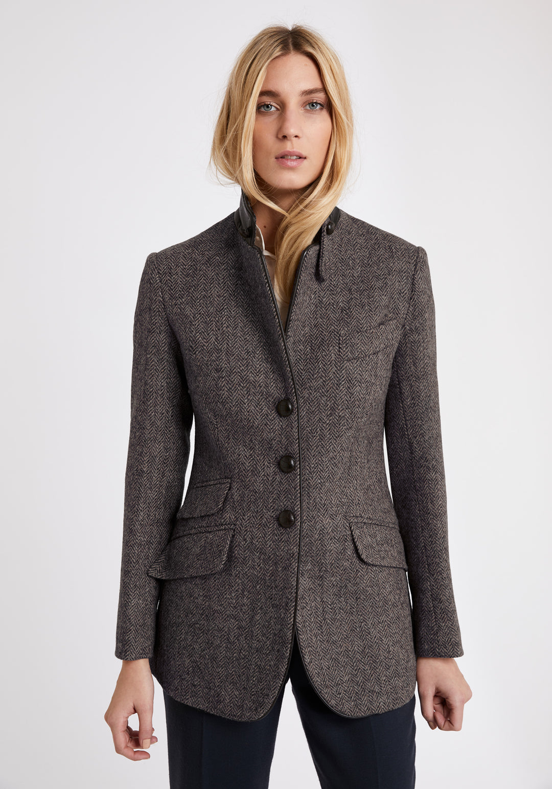 Model wears the Cass jacket, a relaxed boyfriend-style jacket with subtle equestrian inspired detailing.