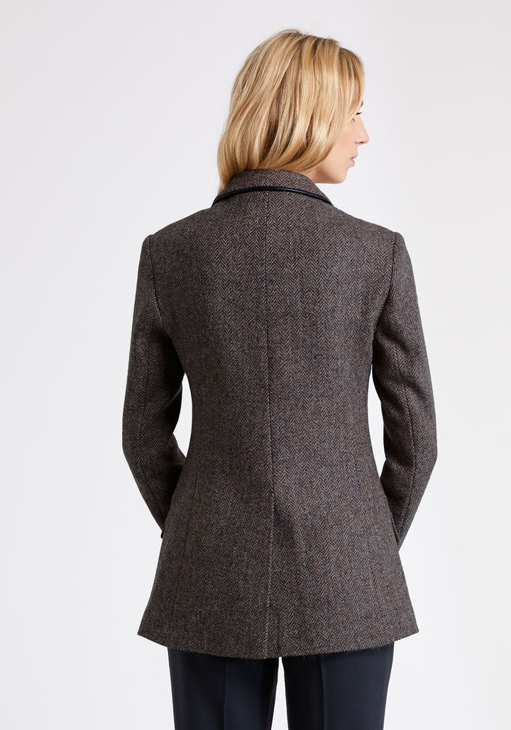 Model wears the Cass jacket, a relaxed boyfriend-style jacket with subtle equestrian inspired detailing.