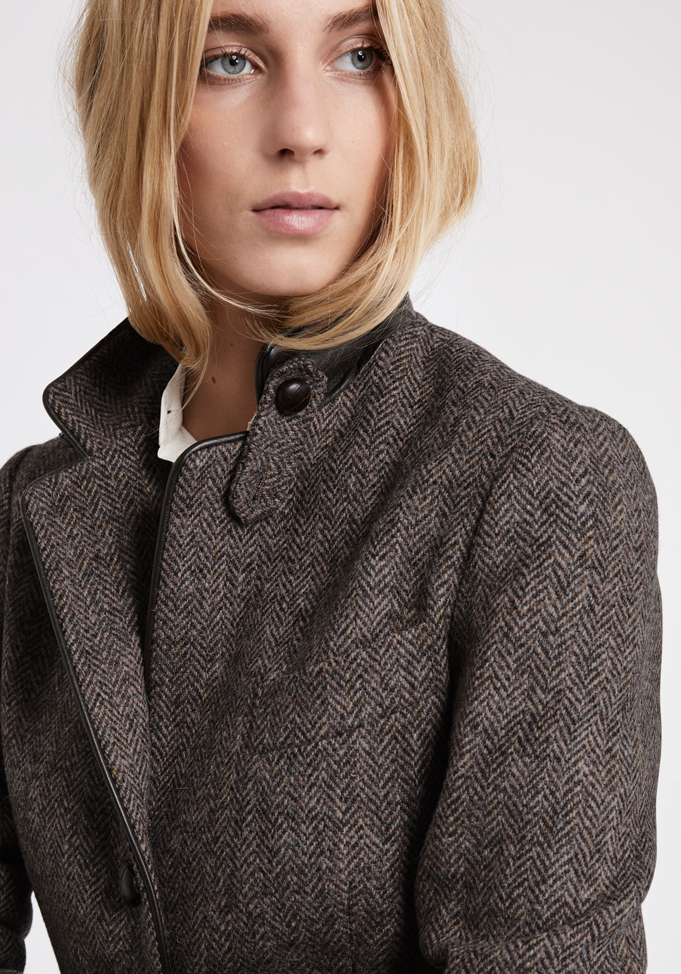 Model wears the Cass jacket, a relaxed boyfriend-style jacket with subtle equestrian inspired detailing.