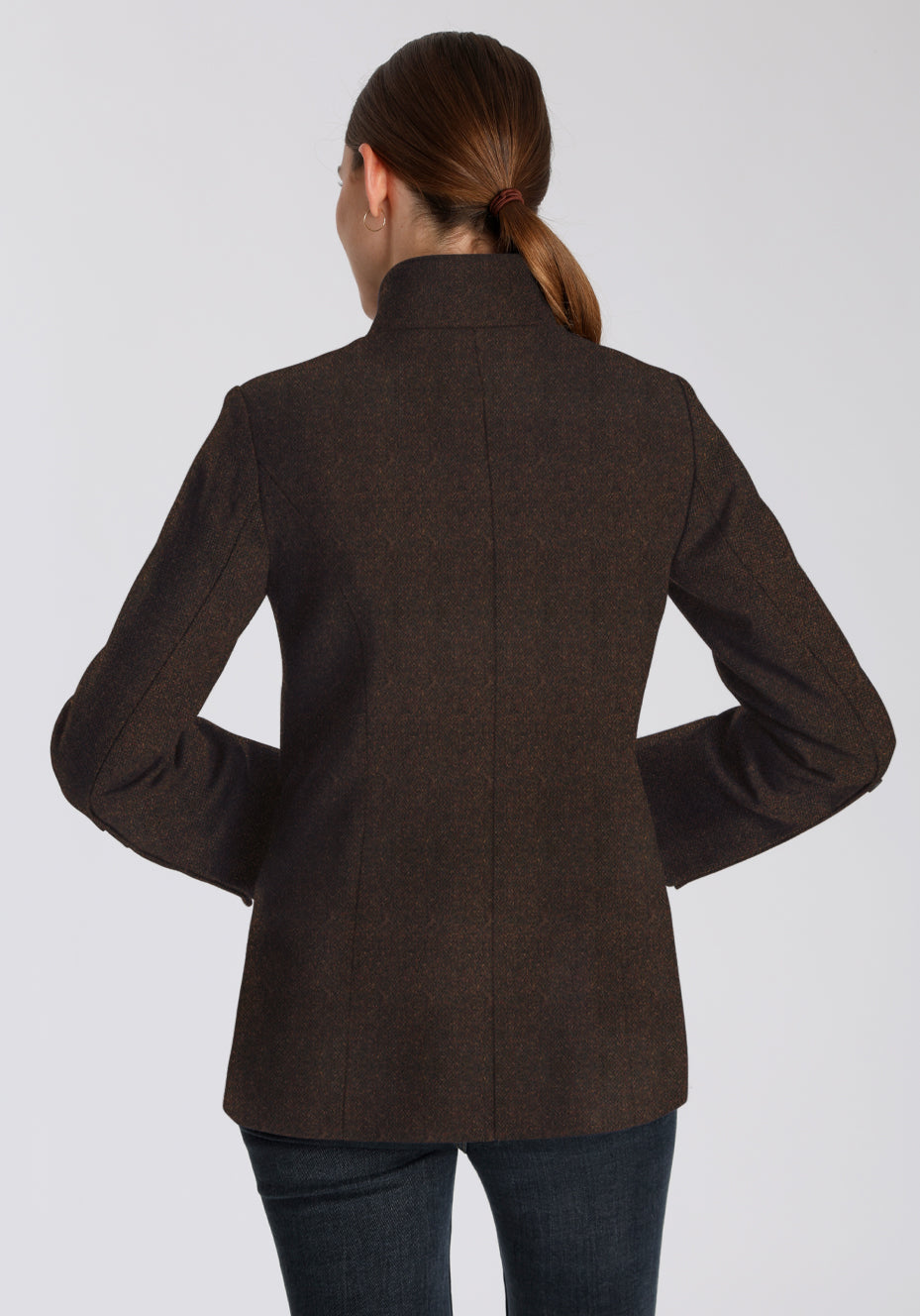 Brown wool jacket worn by a person on a white background